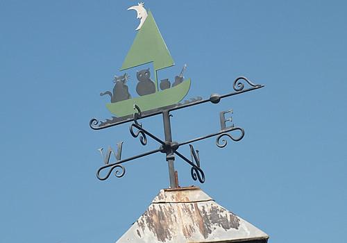 Photo Gallery Image - The Owl and the Pussycat Wind Vane on the Millennium Green building